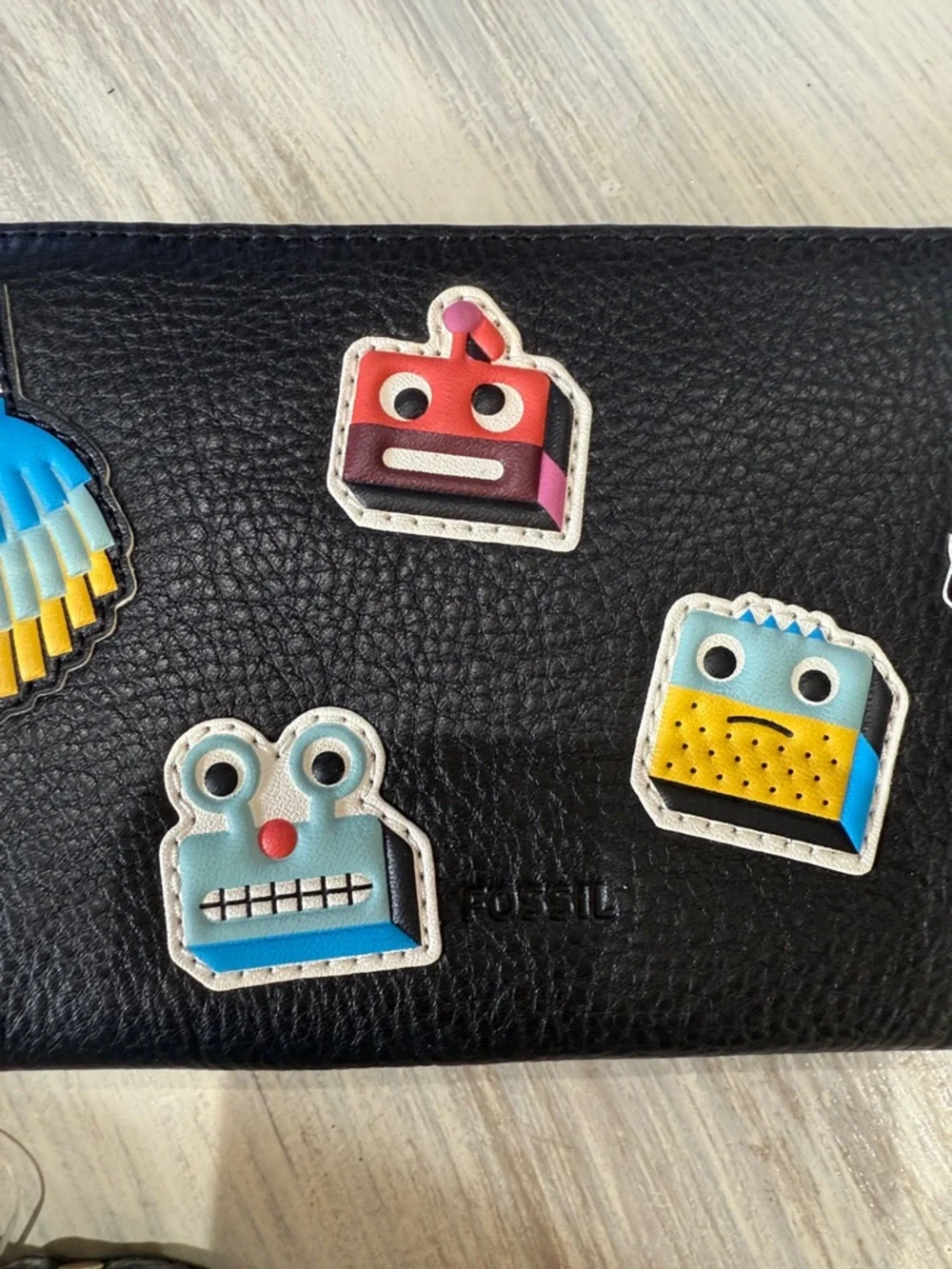 Rare Fossil Emma Black Zip-Around Wristlet with Colorful Robot Appliqués
